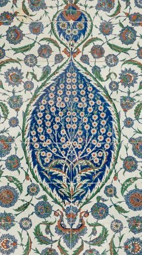 Tile panel with a leaf-shaped medallion